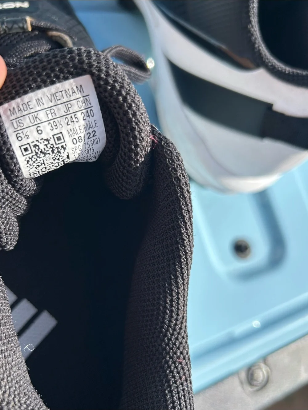 adidas Men’s Black and White ICON Athletic Cleats